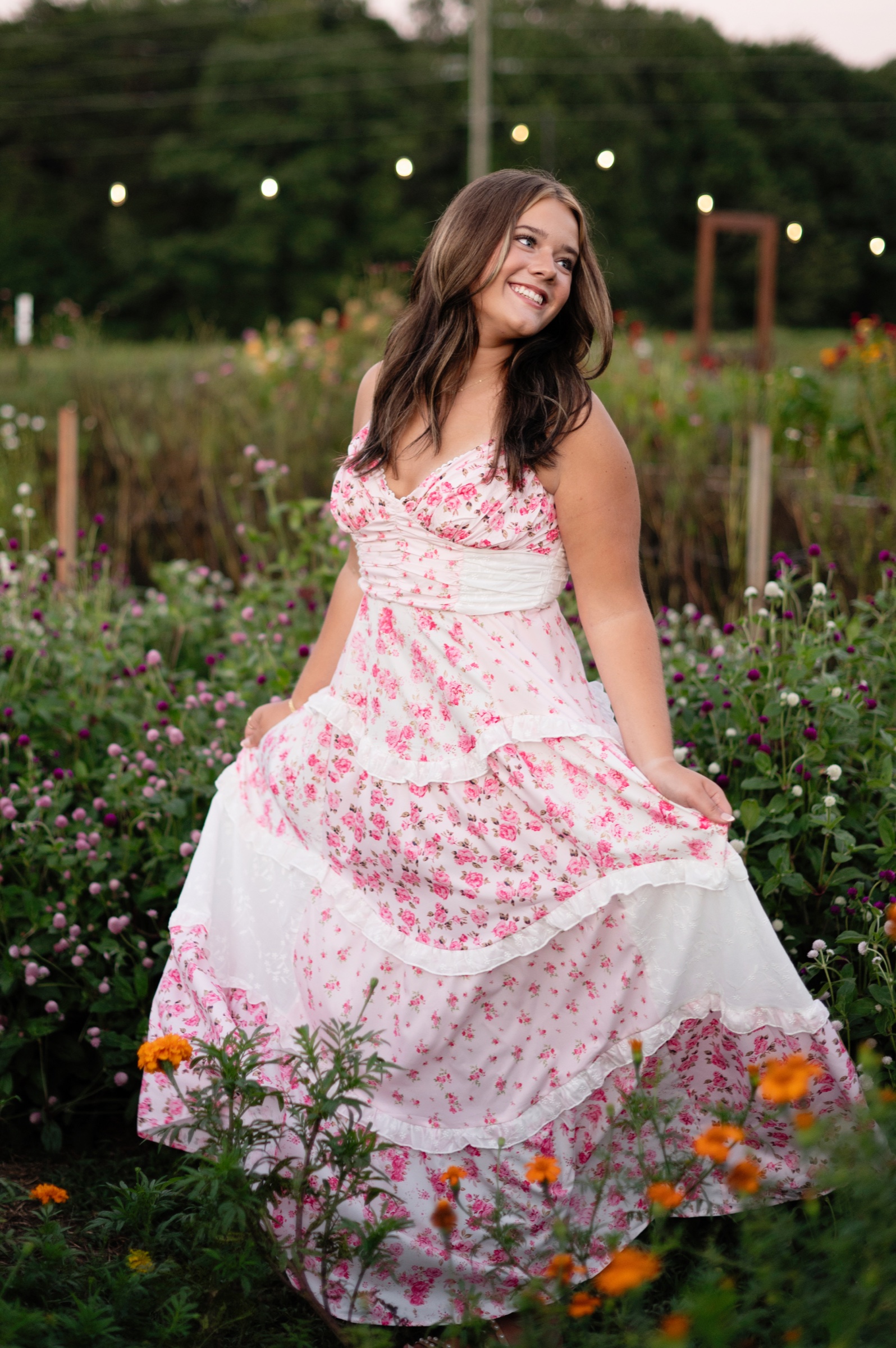 Senior portrait in a flowing floral dress